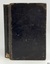 Black fabric hardcover book with shiny textured surface