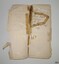 Two page opening, repaired with tape, edges torn