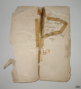 Two page opening, repaired with tape, edges torn