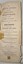 Fly page of upright book, showing repairs and tears.