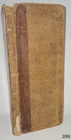 Brown hardcover book with gold embossed spine