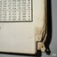 Tabbed index has a printed letter and corners are rolled
