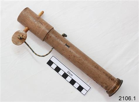 Mushroom coloured flare, base and cap, with operational peg attached by string.