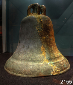 Brass church bell in typical bell shape, with inverted 'U' shaped fittings on top