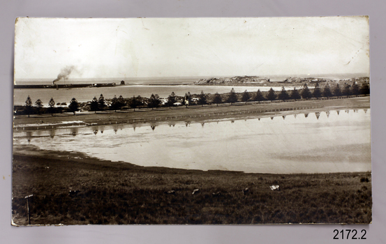 Black and white photograph taken towards Lady Bay, Warrnambool Breakwater and Lake Pertobe