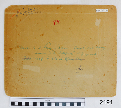 Back has handwritten inscriptions on the card and on a white label
