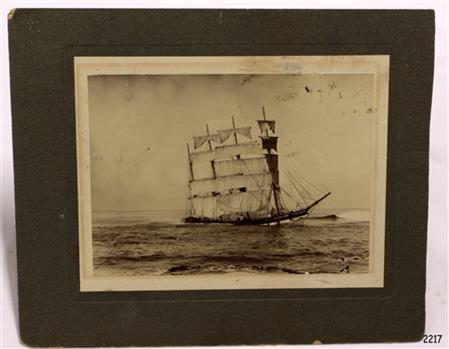 Sepia photograph, ship in full sail at sea