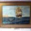 Painting of a sailing ship with full sail, near land, with small row boat in foreground, figures inside it.