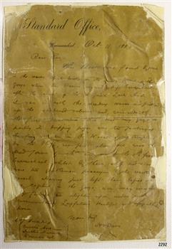 Yellowed sheet of paper with faded black ink, hand written