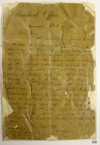 Yellowed sheet of paper with faded black ink, hand written