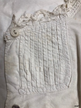 Section of camisole front showing pintucks