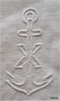 Motif of Maltese Cross hand embroidered on the cloth