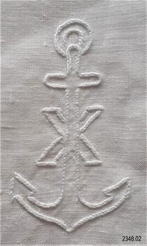 Motif of Maltese Cross hand embroidered on the cloth