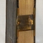 Pages have gold leave edges. a metal clasp holds the centre of front and back covers together 