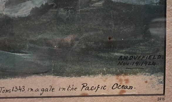 Close-up of area on print showing inscription of lithograph print's artist's name