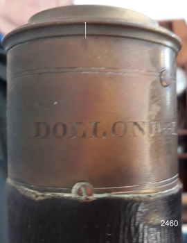 Maker DOLLOND stamped into brass fitting around end of telescope