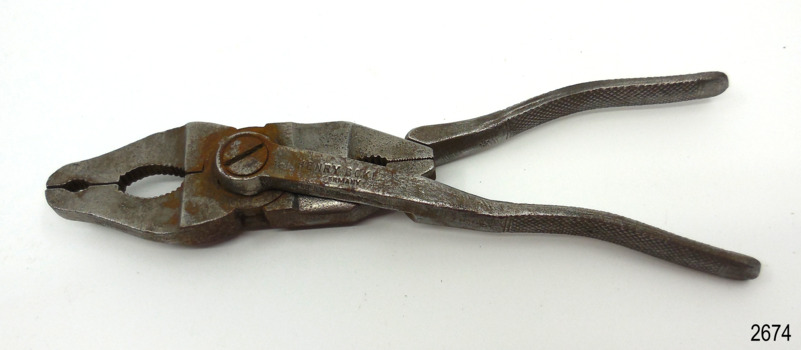 Pliers have been reconditioned. They are unusual in that that have two plier grips.