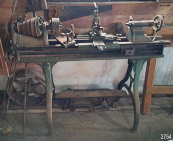 Green painted woodworking lathe 