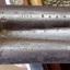 Close-up of shotgun parts, showing inscriptions
