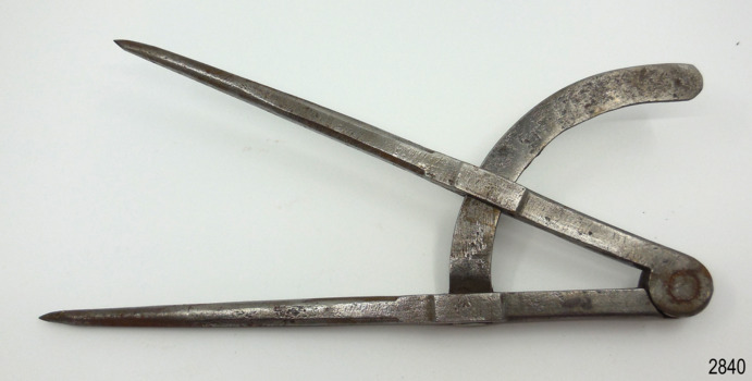 Compass surface is scratched and pitted