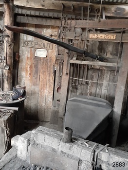 Location of forge and bellows in the blacksmith's shop