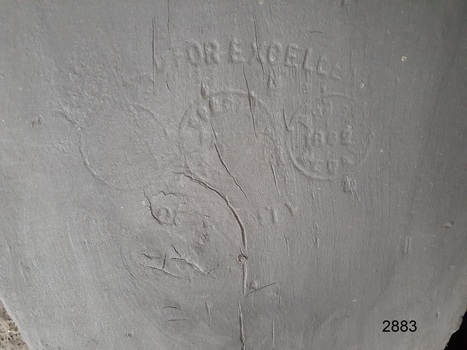 Inscription stamped into the wood of the bellows