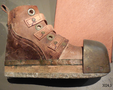Boot is strongly made and reinforced with metal and rivets.