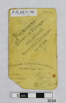 Reverse has a paper label, stamped and printed test, and handwritten signatures and details