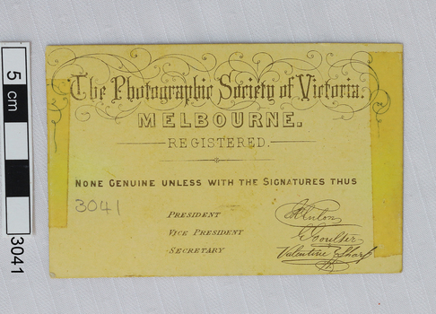 Reverse of rectangular has printed and handwritten details 
