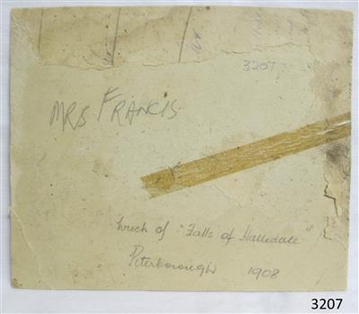 Inscriptions in pencil on cardboard of photograph's reverse side