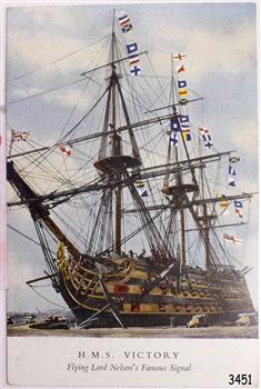 Sailing ship with coloured flags flying and figures on board