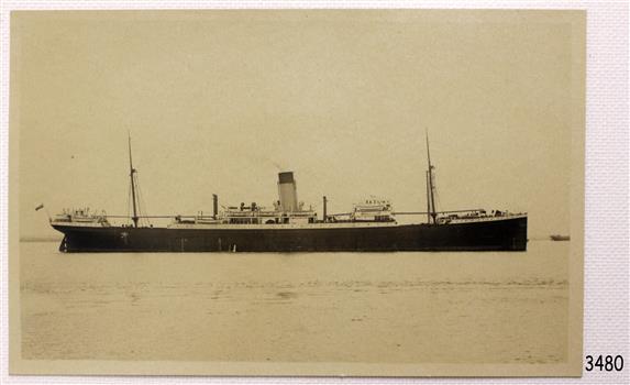 Ship at sea, another in the background.