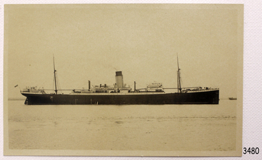 Ship at sea, another in the background.
