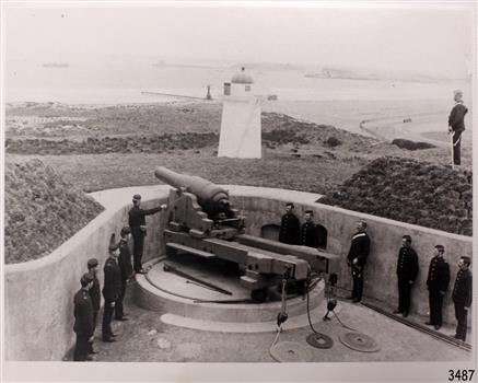 Volunteer Corps beside cannon on Flagstaff Hill facing Lady Bay