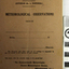 Brown cardboard cover with printed text