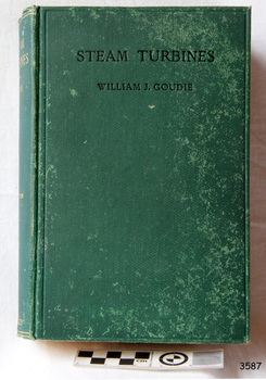 Book with textured green hardcover, black title on cover, gold embossed title on spine 