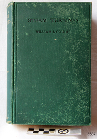 Book with textured green hardcover, black title on cover, gold embossed title on spine 