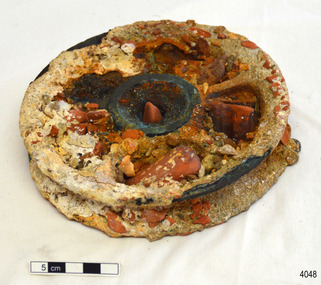 Pulley sheave's metal component, covered with encrustations