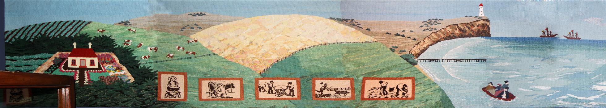 The coloured tapestry section shows river's mouth, hills, lighthouse, vessels in the sea