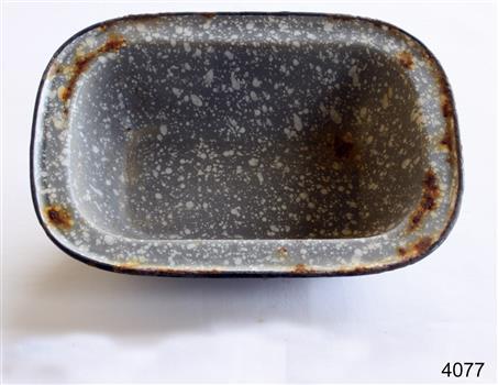Oblong enamel baking dish. Grey with white speckling.