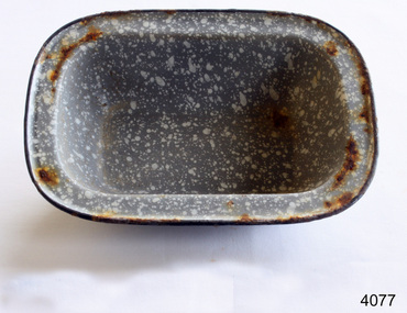 Oblong enamel baking dish. Grey with white speckling.