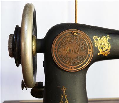 Round logo of ANA on head of machine