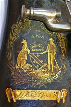Logo shows standing kangaroo, southern cross on shield, man and rising sun images