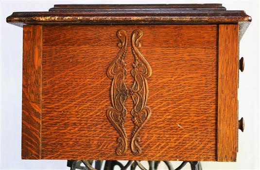 Machine side has decorative carving