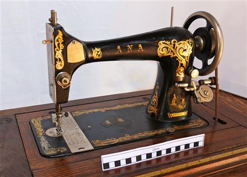 Machine has black body decorated with decals and brands
