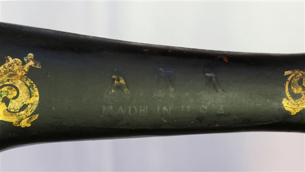 Inscription is difficult to see but shows machine was made in Australia