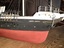 Ship's name is painted in gold capital letters
