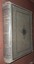 Spine and front cover of upright book