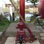 Pump has the base of the standpipe in the background, and the rear of the water cart beside it