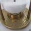 Inscriptions and patterns in the metal bas of the hourglass